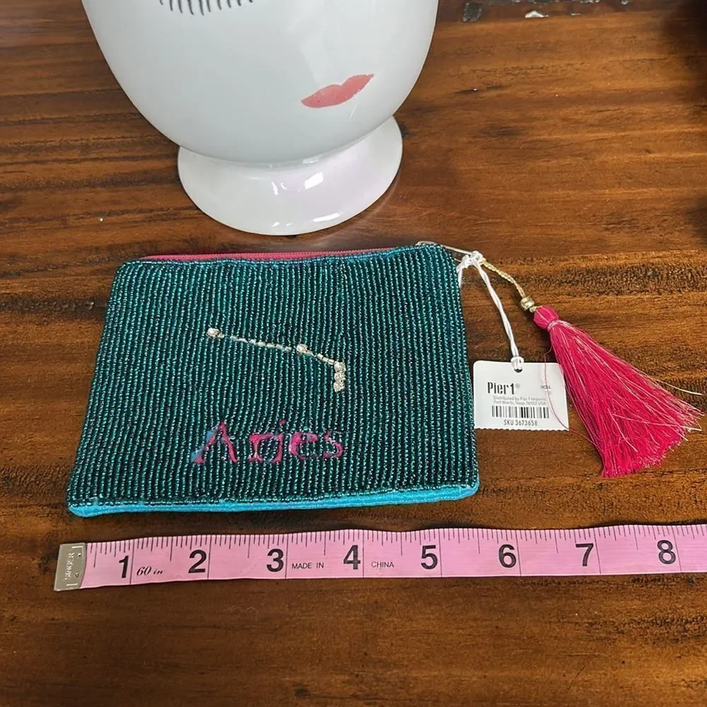 Pier 1 Aries small bag with tassel NWT